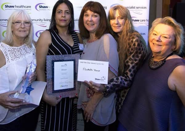 Elizabeth House employees, Marian Drake, Marcia Ellis, Jacqueline Warren and Mandy Thurgood, with Davina Ludlow (R), CEO of Carehome.co.uk