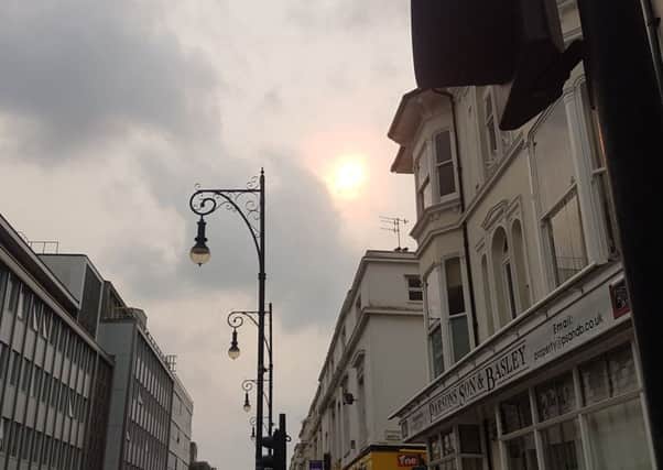 The red sun in Brighton due to Storm Ophelia