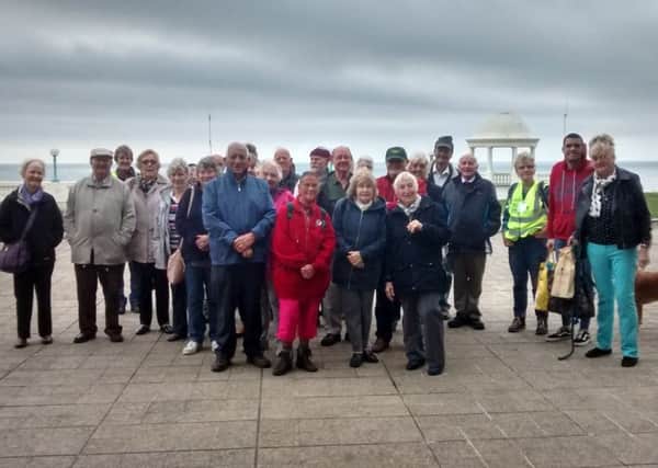 Bexhill Health Walk participants celebrate 13 years of keeping fit.