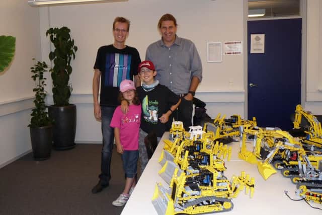 Andrew Day meeting the Lego designers in 2010 with his sister Katie