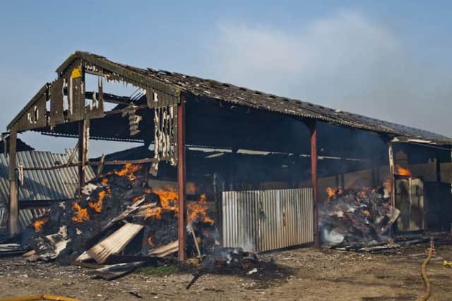 Firefighters tackle barn blaze in Rowfant.