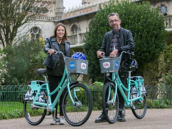 American Express employees with the Brighton bikes