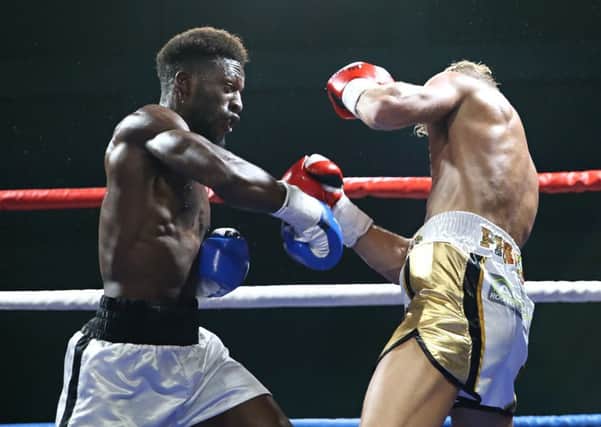 Mwenya Chisanga getting the better of Jonny Phillips / Photo by Natalie Mayhew - Butterfly Boxing