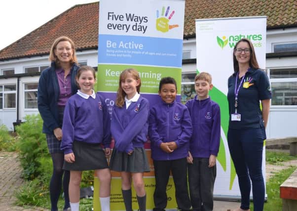 Portfield Primary Academy pupils with Stephanie Jones from Natures Way Foods, left, and Elle Caldwell, youth engagement officer at Chichester District Council