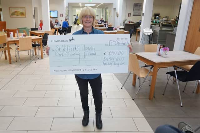 Shirley Venn raised Â£1,000 for St Wilfrid's Hospice through her wing walk SUS-171019-111044001