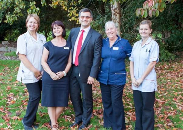 Consultant breast surgeon Mr Marek Ostrowski with, from left, associate practitioner Kerry West, adminstrator Zena Williams, oncology manager Karen West and oncology nurse specialist Clair De Lillis SUS-171023-101433001