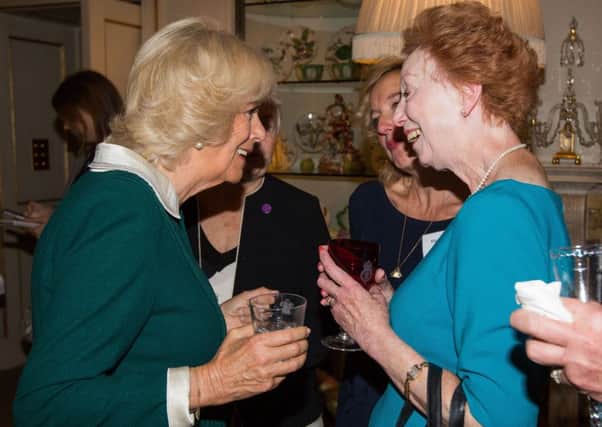 Celia Dennis with the Duchess of Cornwall. Picture by Michael Crabtree
