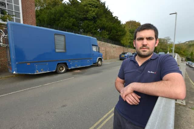 Concerned: Nick Hazle and the van which has been converted into a motor home