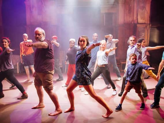 Fathers take to the stage with their children as part of the 'Dad Dancing' show