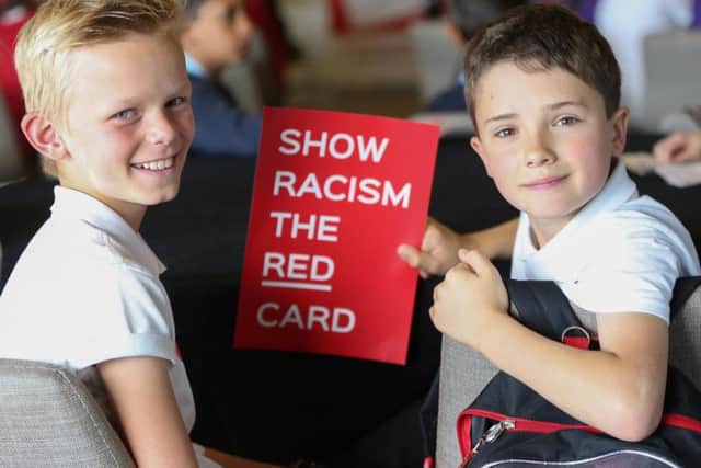 Students show racism the red card