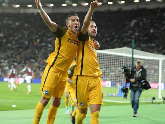 Anthony Knockaert and Glenn Murray celebrate Albion's third goal. Picture by Phil Westlake (PW Sporting Photography)