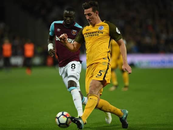 Lewis Dunk in action at West Ham. Picture by Phil Westlake (PW Sporting Photography)