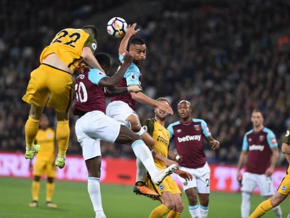 Shane Duffy wins a header at West Ham on Friday. Picture by Phil Westlake (PW Sporting Photography)
