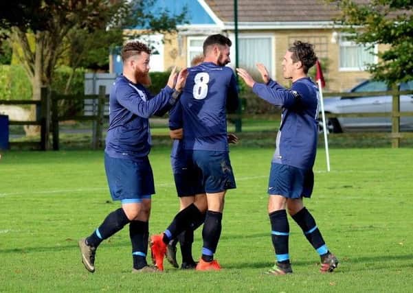 Nyetimber Pirates celebrate one of their goals against Newtown Villa / Picture by Roger Smith