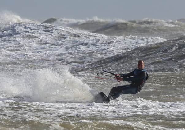 Worthing's Lewis Crathern in his home town during Storm Brian. Pictures: EUNICE BERGIN