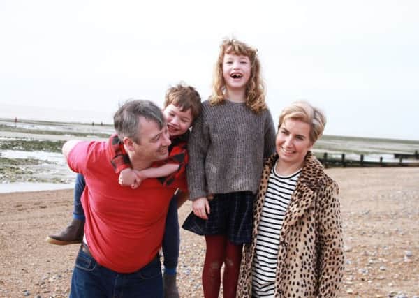 Blogger Juliet Evans with her husband, Morris, and their children Alice, eight, and Alexander, five, enjoying Shoreham Beach