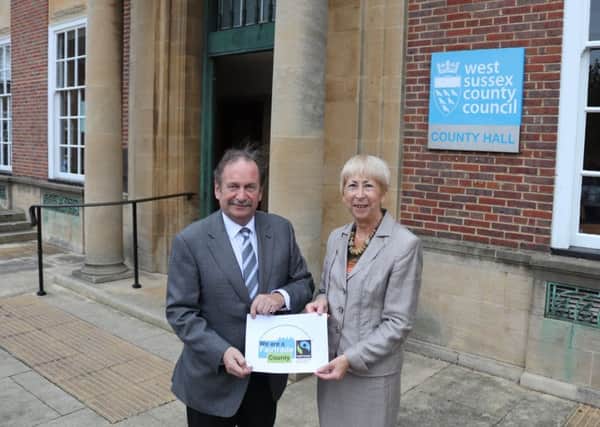 Jeremy Hunt, cabinet member for finance and resources, and Morwen Millson, Lib Dem county councilllor who sits on local Fairtrade steering group, celebrating West Sussex being awarded Fairtrade county status