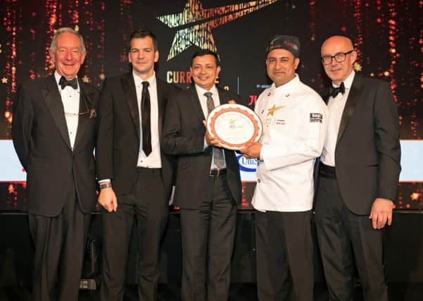 (Left to right): Michael Buerk, broadcast journalist, Mr Ben Carter, marketing director of Just Eat, Syed Shamim Ahmed, owner of Shaan Indian Cuisine, winning chef Maruf Ahmed Pathan from Shaan and Matt Western MP. Picture: Kois Miah