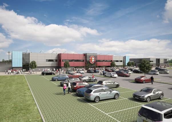 A computer generated concept image showing an aerial view of what the proposed Combe Valley Sports Village may look like from across the car park towards the football stadium.