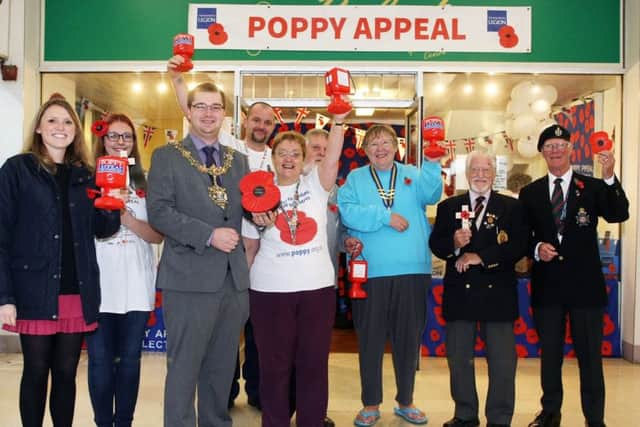 Worthing mayor Alex Harman opens the Poppy Appeal shop in the Guildbourne Centre. Photo by Derek Martin DM17103342a