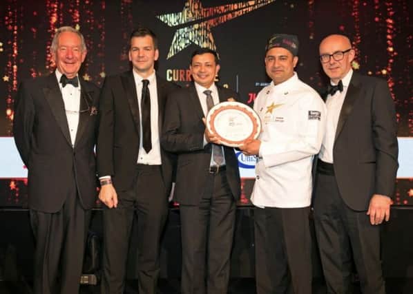 Michael Buerk, broadcast journalist, Ben Carter, marketing director of Just Eat, Syed Shamim Ahmed, owner of Shaan Indian Cuisine, wining chef Maruf Ahmed Pathan from Shaan, and Matt Western, MP