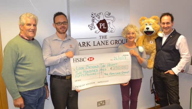 Jim and Lyn Langlands are pictured with Mark Nash of The Park Lane Group and Steve Hewlett