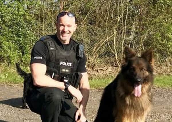 Max and his handler, PC Mark Fox