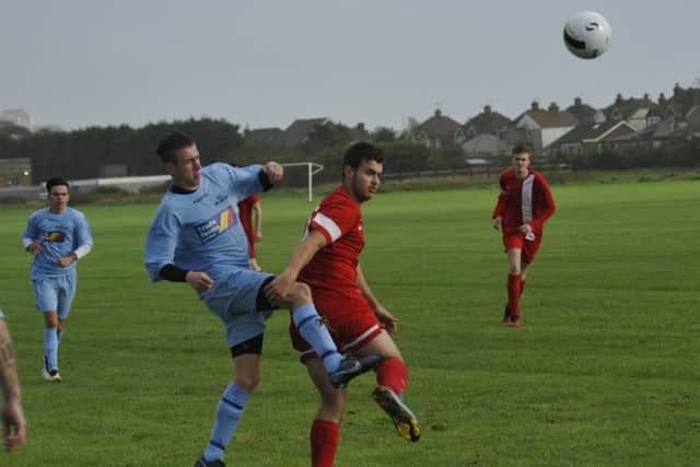 AFC Hollington and Beckley Rangers shared 10 goals at a blustery Bexhill Road.