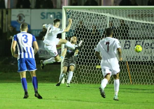 Sam Cruttwell puts Hastings United ahead during Tuesday night's 2-1 defeat at home to Thamesmead Town. Picture courtesy Scott White