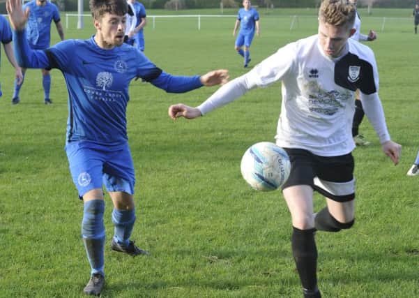 Corey Wheeler on the ball during Bexhill United's 8-0 win over Midhurst & Easebourne. Pictures by Simon Newstead