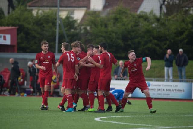 Worthing celebrate after Ben Pope fired them 2-0 in front on Saturday. Picture by Marcus Hoare