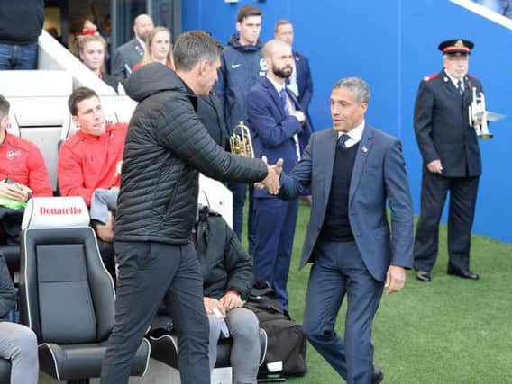Chris Hughton and Mauricio Pellegrino shake hands before kick-off. Picture by PW Sportings Pics