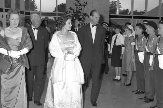 Mandatory Credit: Photo by Woods/REX/Shutterstock (9186630a)
Queen Elizabeth II wearing a long evening gown and a white fur stole, and accompanied by her husband Prince Philip, the Duke of Edinburgh, inspects ambulance cadets at the new Chichester Festival Theatre, Chichester, Sussex, on July 31, 1962, when she attended a charity performance of Chekhov's Uncle Vanya. On the left is the Duke of Norfolk and the Duchess. The performance of Uncle Vanya, which starred director Sir Laurence Olivier, was in aid of the St John Ambulance Brigade and British Red Cross Society.
'Uncle Vanya' at the Chichester Festival Theatre, UK - 31 Jul 1962