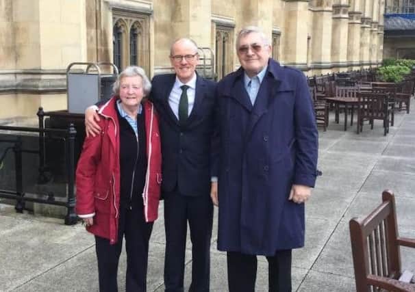 Anne Bass, Nick Gibb and John Bass, on the terrace of the House of Commons