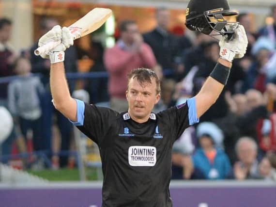 Chris Nash celebrates a century for Sussex. Picture by PW Sporting Photography