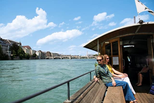 Four Ferries connect both sides of the Rhine. Here the Muenster-ferry, popularly called 'Vogel Gryff'. Copyright: Switzerland Tourism. Photo: swiss-image.ch/Gian Marco Castelberg & Maurice Haas