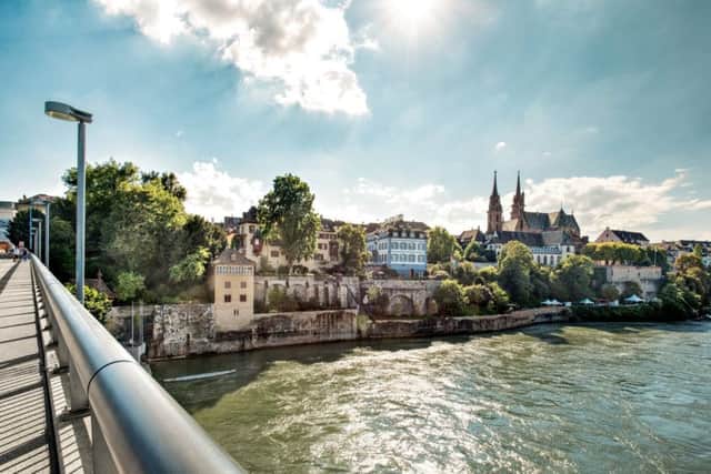 Wettsteinbruecke with a view of the old town and cathedral, Basel. Copyright: Switzerland Tourism. Photo: swiss-image.ch/Nico Schaerer