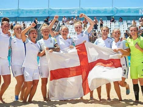England's beach soccer team celebrate after winning the Euro competition