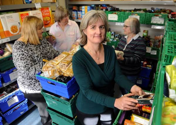 Ruth Hodgson and helpers at Horsham Food Bank store. The food bank is looking for new, larger premises for the storage of donated food. Pic Steve Robards SR1726234 SUS-171030-163554001