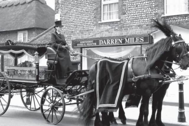 The horse-drawn hearse, pictured when Darren first opened his business
