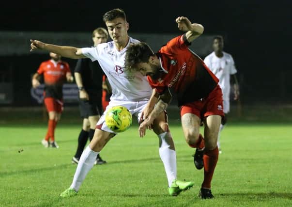Davide Rodari tussles for possession during Hastings United's 3-1 win at home to Hassocks in the Parafix Sussex Senior Challenge Cup on Tuesday night. Picture courtesy Scott White