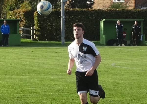 Connor Robertson in action for Bexhill United against Storrington last weekend. Picture courtesy Mark Killy