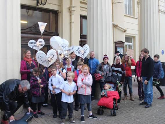 Parents and children protested outside the town hall before the Full Council meeting