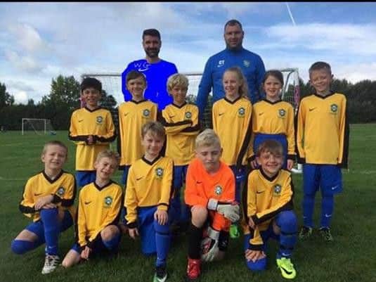 Carl Heskey (back, right) with his Worthing Brazilian Masters under-nine team.