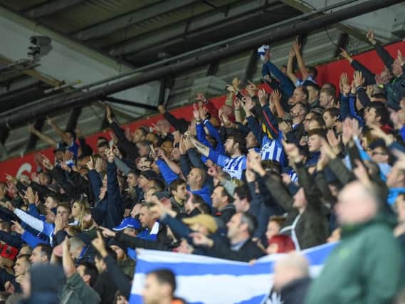 Albion fans celebrate the win at Swansea. Picture by Phil Westlake (PW Sporting Photography)