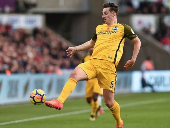 Lewis Dunk in action at Swansea on Saturday. Picture by Phil Westlake (PW Sporting Photography)
