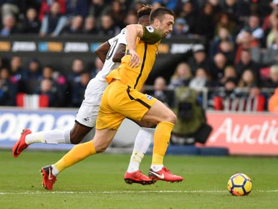 Shane Duffy under pressure from Swansea striker Tammy Abraham during Albion's 1-0 win on Saturday. Picture by Phil Westlake (PW Sporting Photography)