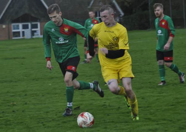 Ninfield VFC in possession during their Division Four match at home to Bexhill AAC II. Pictures by Simon Newstead