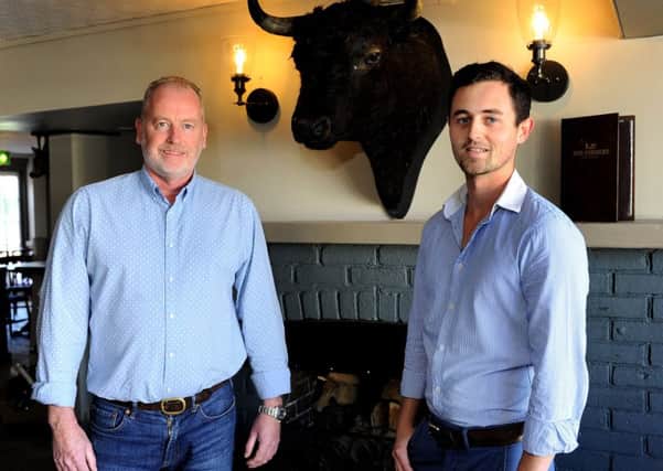 New owners at The Farmers pub, Lewes Road, Scaynes Hill, Michael and Jack Willis. Pic Steve Robards SR1727015 SUS-170611-182138001