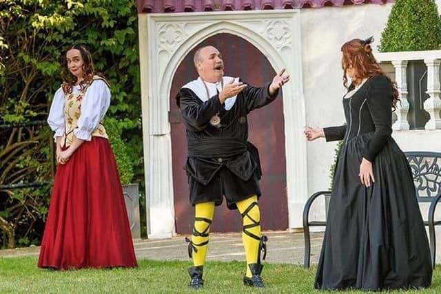Joy Andrews, left, as Maria, and husband Gary, as Malvolio in a production of Shakespeare's Twelfth Night at Polesden Lacey SUS-170811-095223001